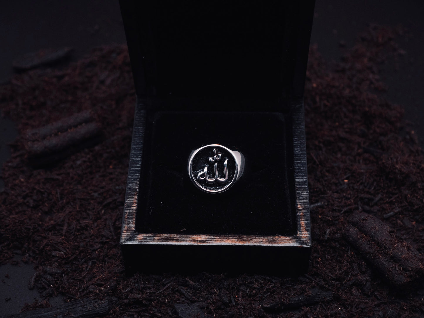 Mutawakkil Quwwah black Islamic ring engraved with Allah in Arabic calligraphy, presented in luxury black gift box